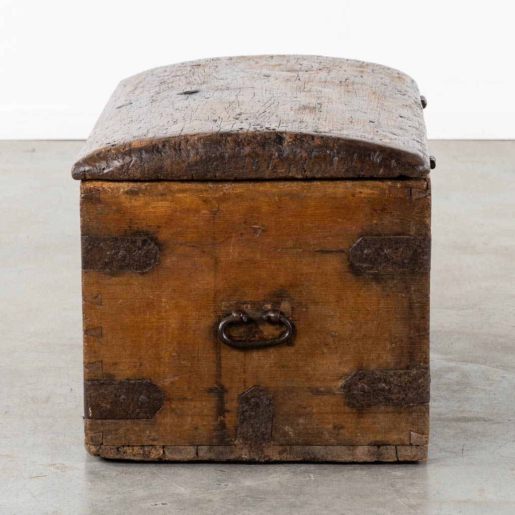 An antique chest with wrought iron hardware, circa 1700. (L:52 x W:93 x H:48 cm)