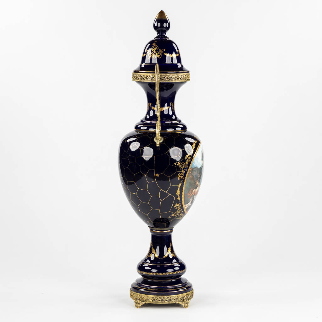 A decorative cobalt blue vase mounted with bronze, in the style of Sèvres. 20th C. (L:30 x W:42 x H:110 cm)