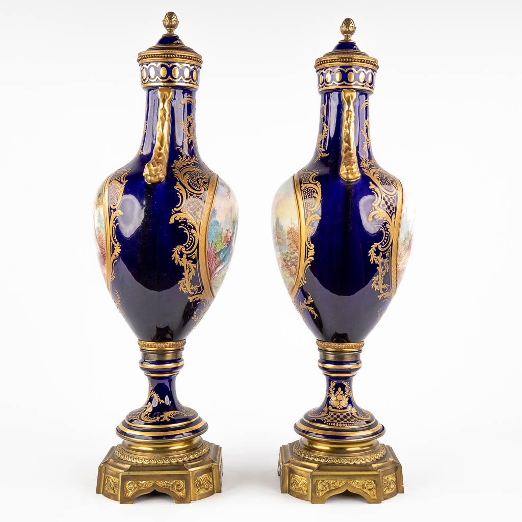 A pair of hand-painted and cobalt blue vases, J. Tiélès, Paris, France. (H:67 x D:20 cm)