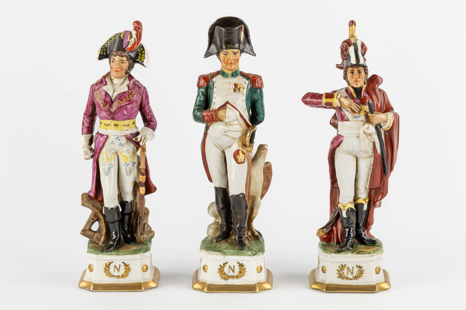 Napoleon and the generals, polychrome porcelain. 15 + 3 pieces. (L:9,5 x W:10 x H:31 cm)