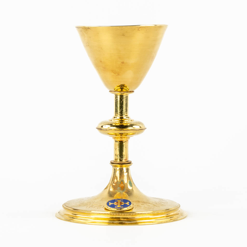 A Gothic Revival Chalice, gold-plated brass with an enamel plaque. 19th C.