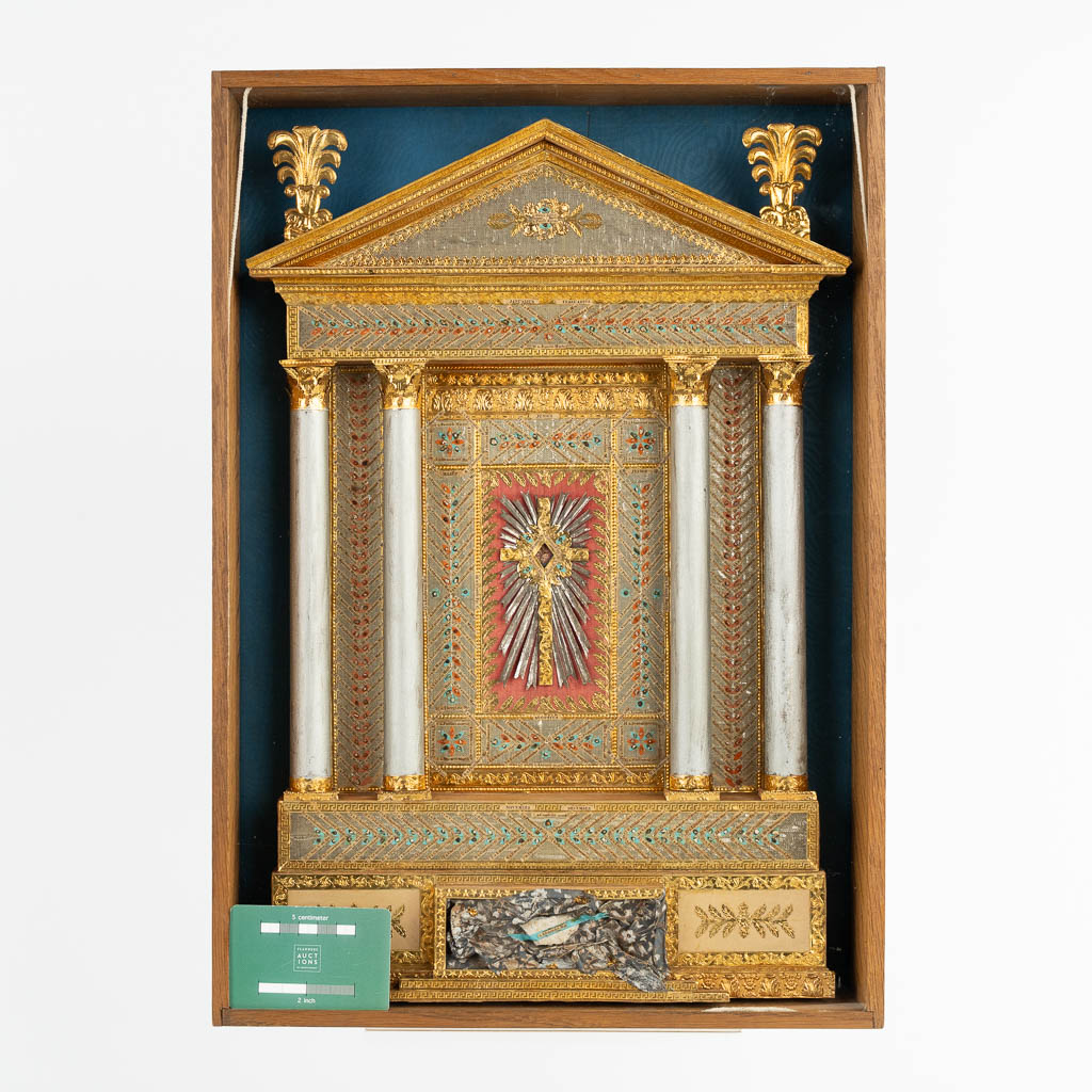 A large reliquary calendar, added with a relic of the True Cross and Objects of passion. 19th C.