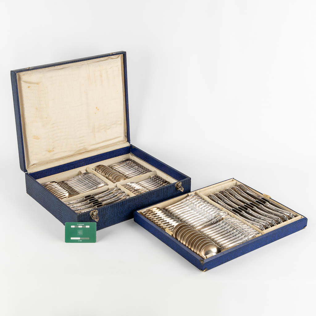 A 84-piece silver-plated cutlery in Louis XV style. (L:33 x W:40 x H:10 cm)