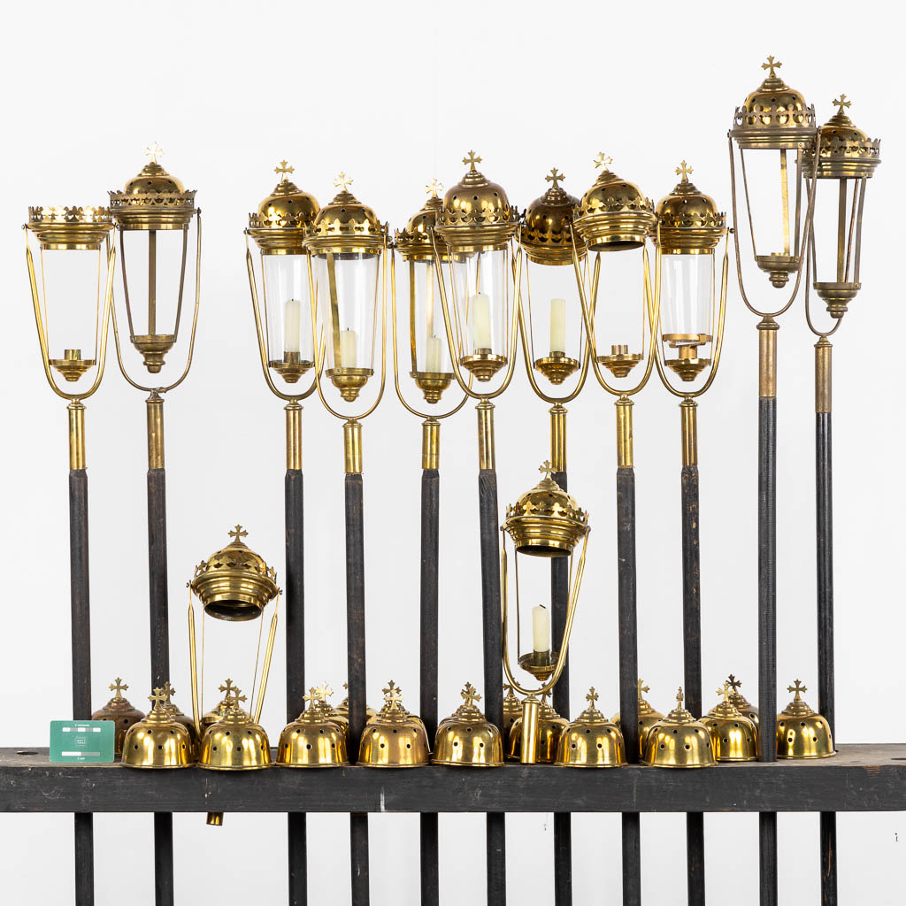 Twelve processional lanterns, brass and glass. Gothic Reivial. (H:137 cm)