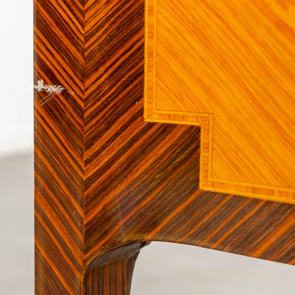 A two drawer side cabinet, marquetry inlay with a marble top. (L:39 x W:72 x H:81 cm)