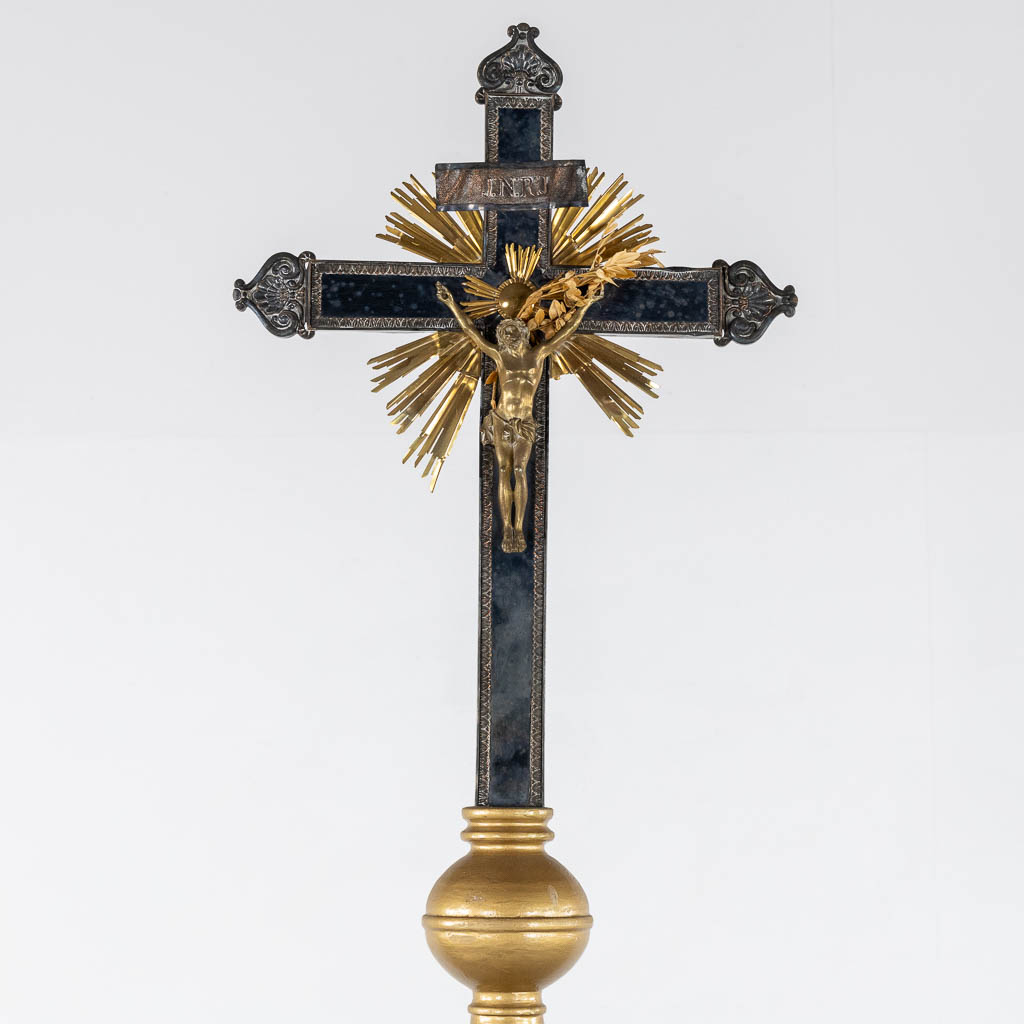 Four Processional crucifixes with their stands. Silver-plated metal and Brass. (H:265 cm)