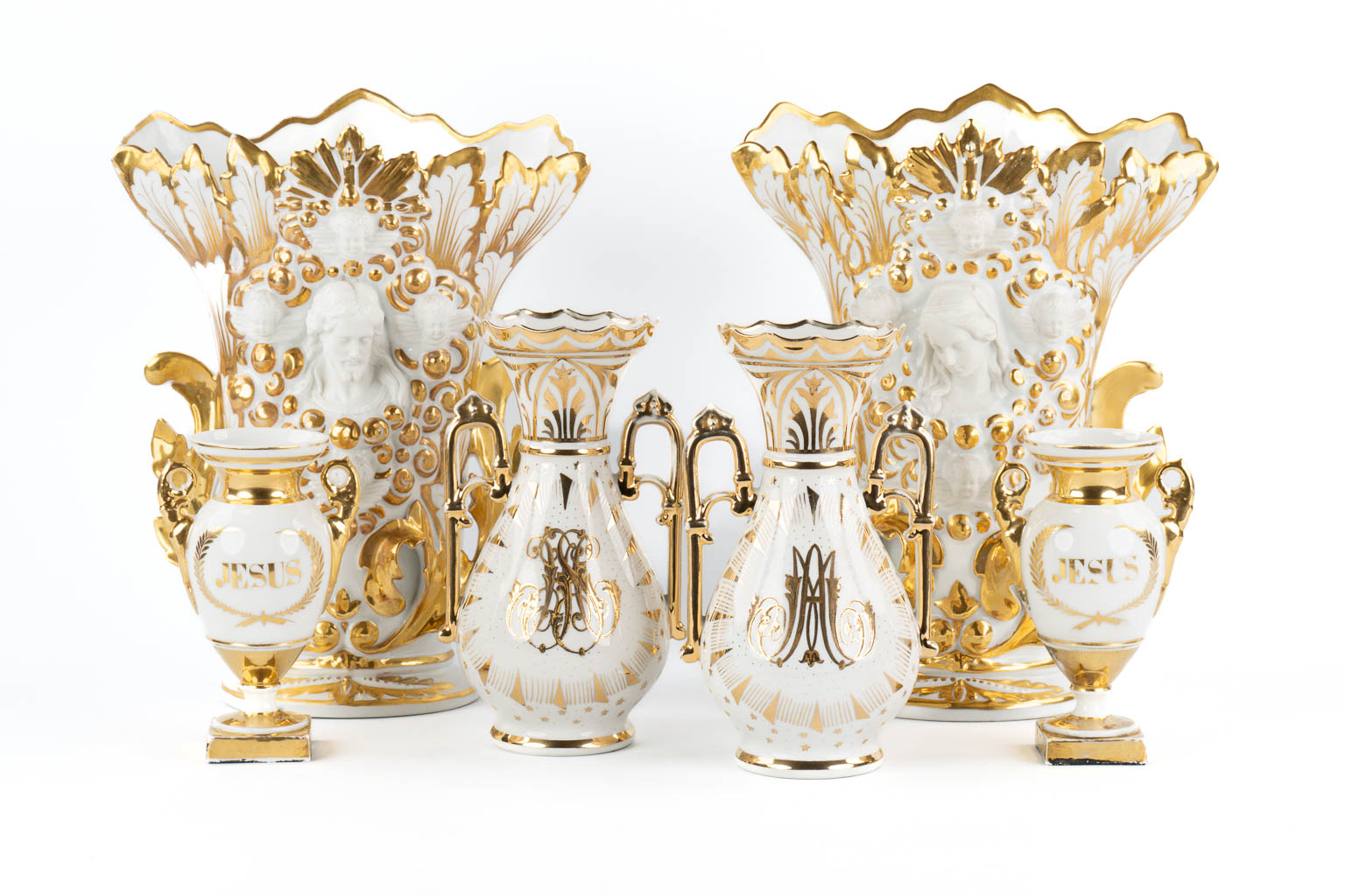 Three pairs of Vieux Bruxelles or Paris porcelain, Images of Jesus Christ and Virgin Mary. 19th C.