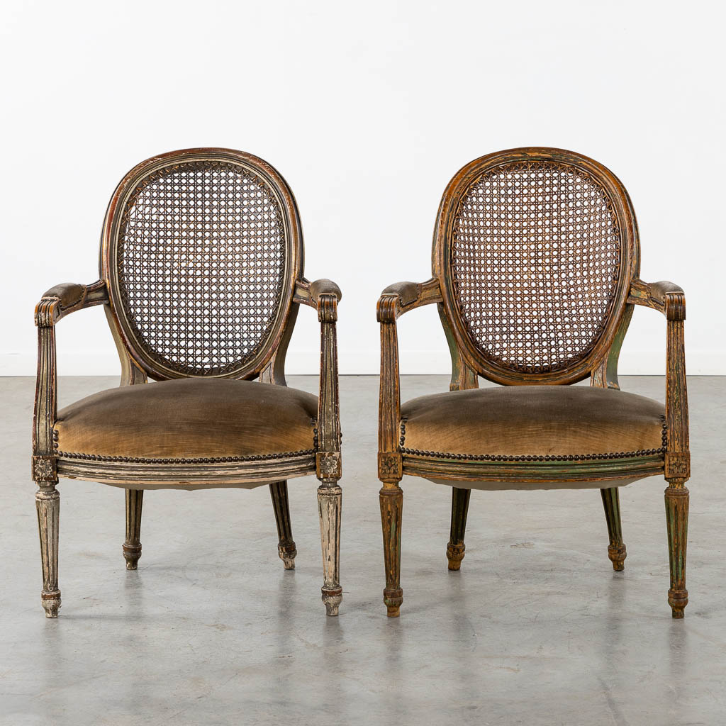 A pair of antique patinated chairs, Louis XVI style. (L:58 x W:57 x H:83 cm)