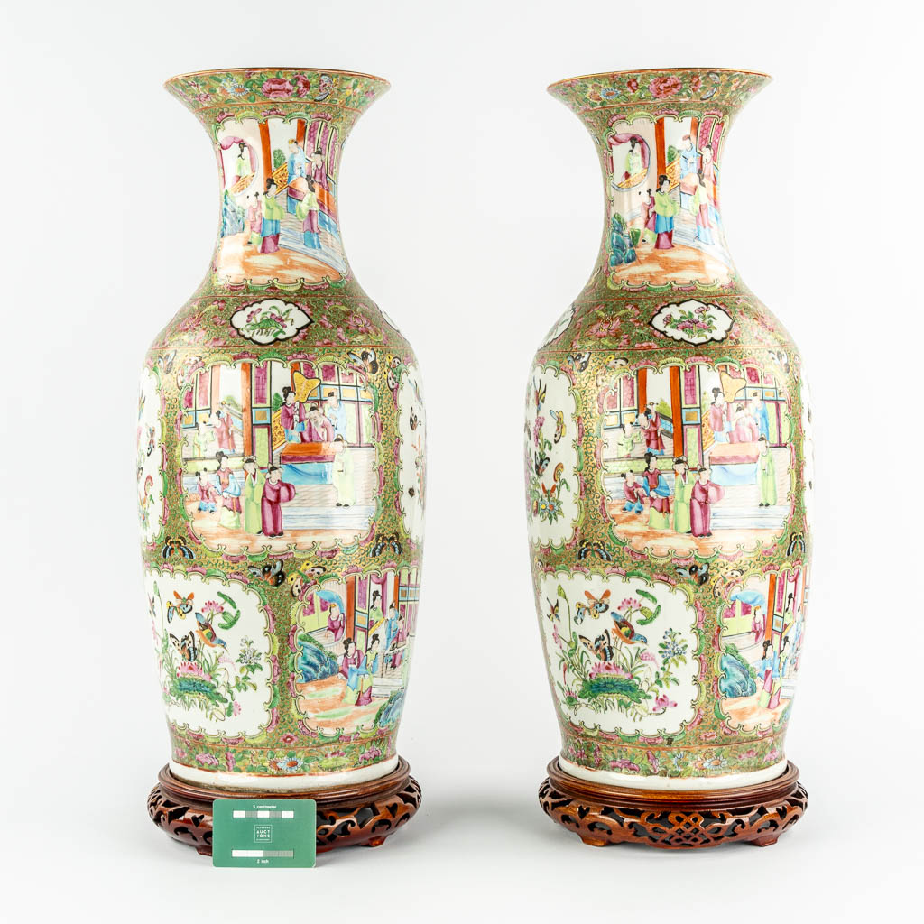 A pair of Chinese Canton vases, decorated with Ladies, fauna & flora, 19th C.