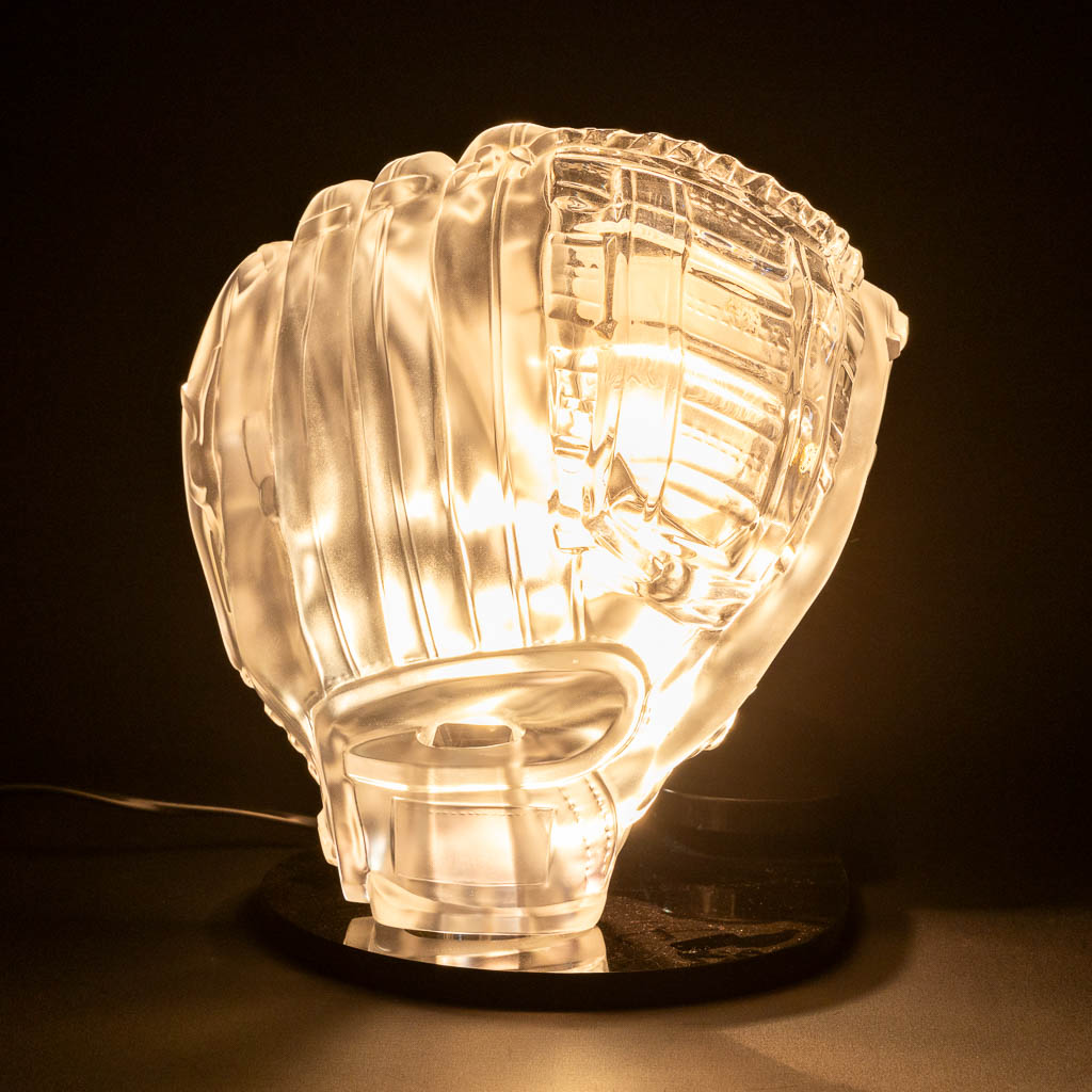 Christalleries Royales De Champagne. A baseball glove table lamp, Glass. (L:25 x H:28 cm)