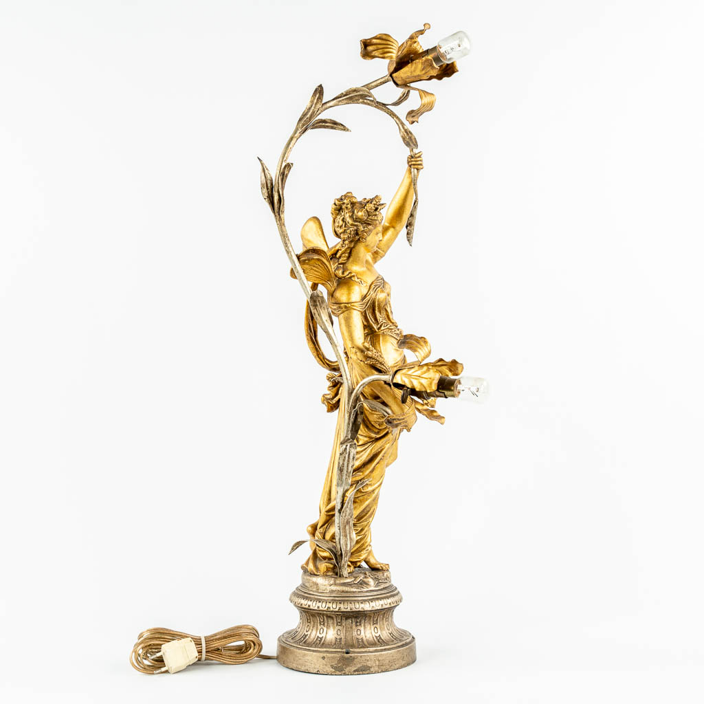 A table lamp with an Angel or Nimph, gilt spelter. (c.1900). 