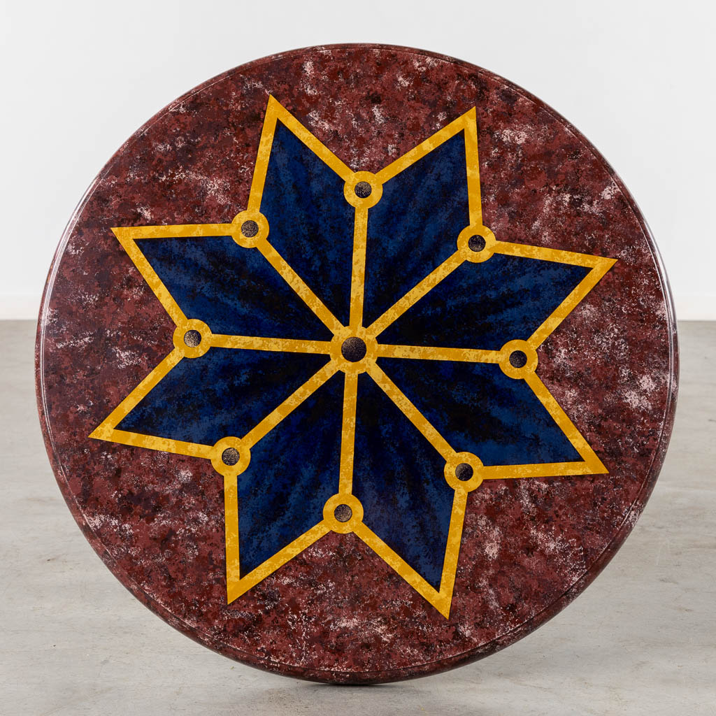 A decorative side table with a geometric decor 'Faux Lapis Lazuli and marble'.