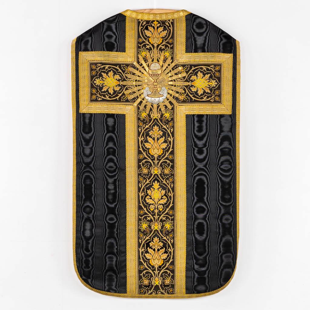 A Cope, Roman Chasuble, Dalmatic and Stola/Maniple, thick gold thread embroideries. 