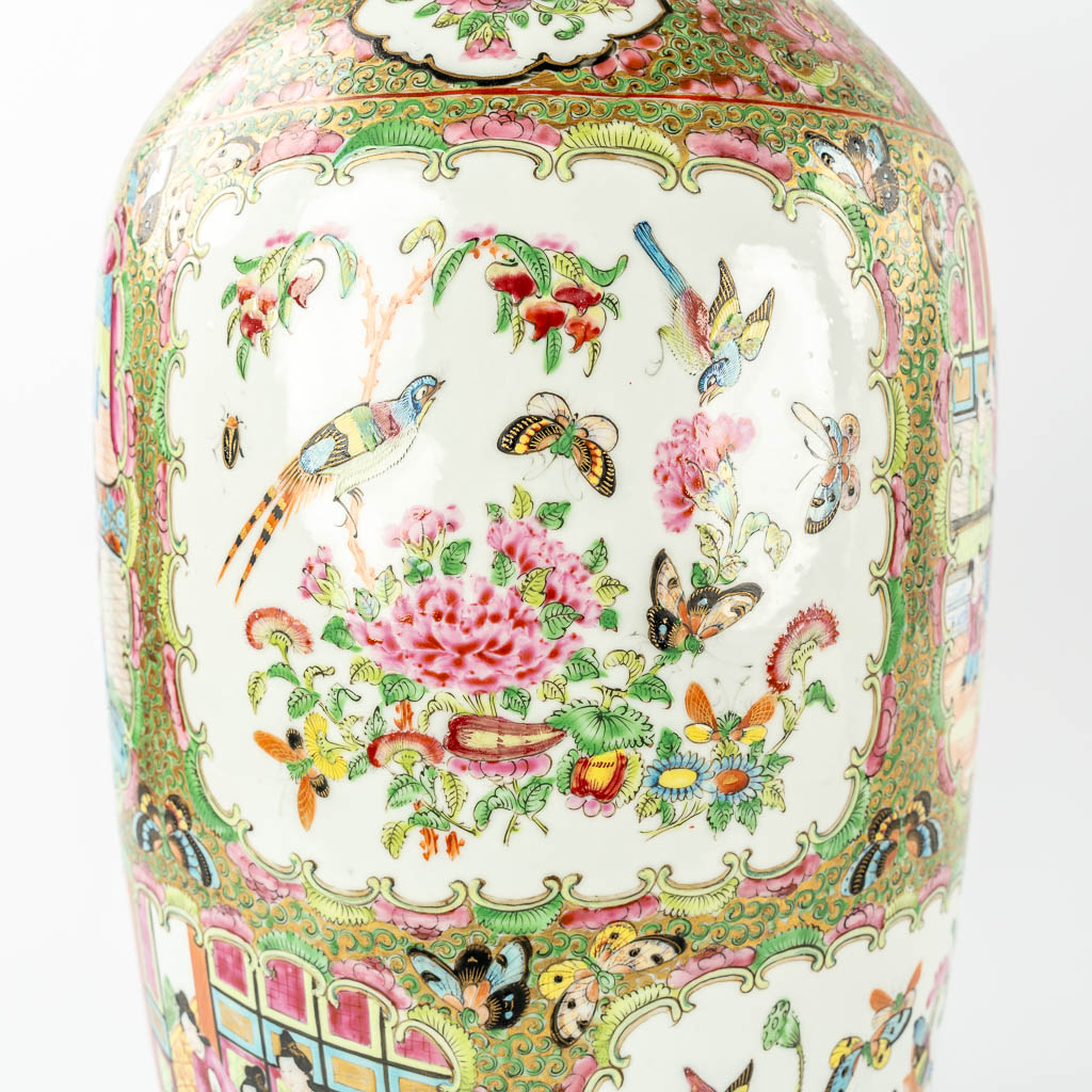 A pair of Chinese Canton vases, decorated with Ladies, fauna & flora, 19th C.