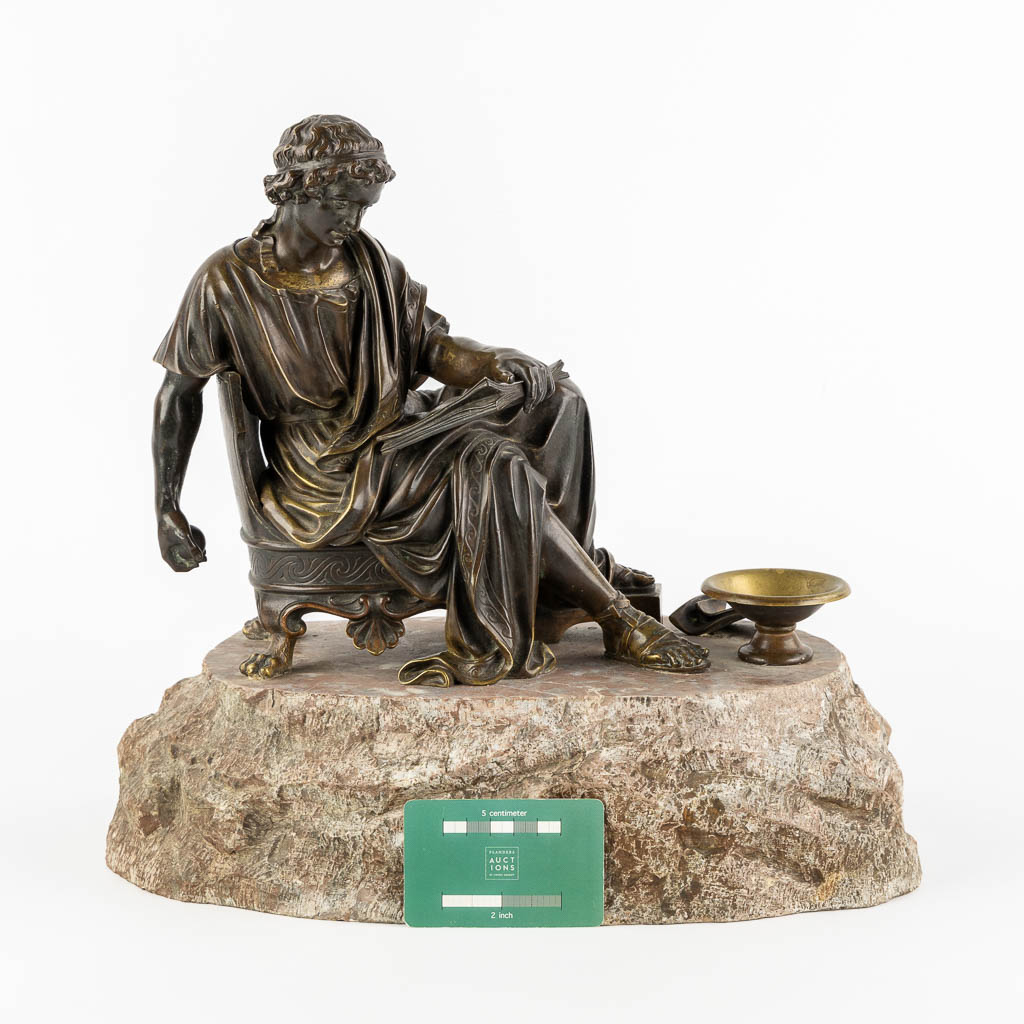 The Reading Roman, patinated bronze. 19th C. (L:23 x W:38 x H:34 cm)