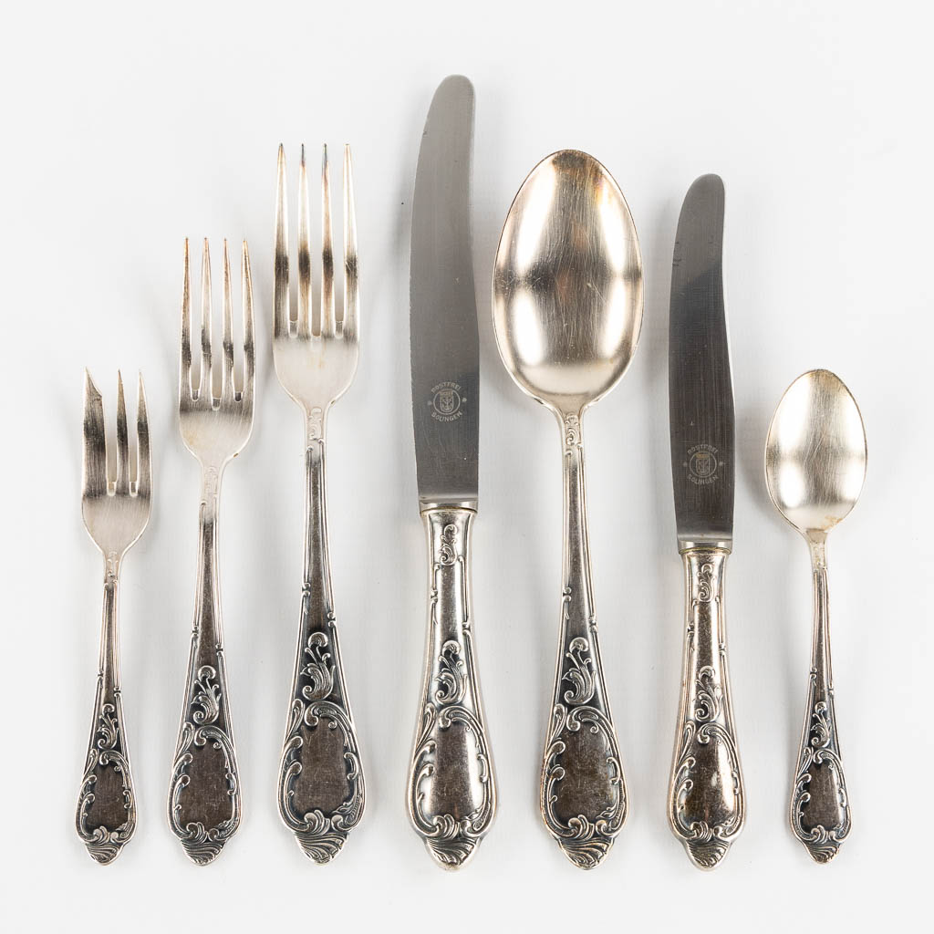 A 84-piece silver-plated cutlery in Louis XV style. (L:33 x W:40 x H:10 cm)