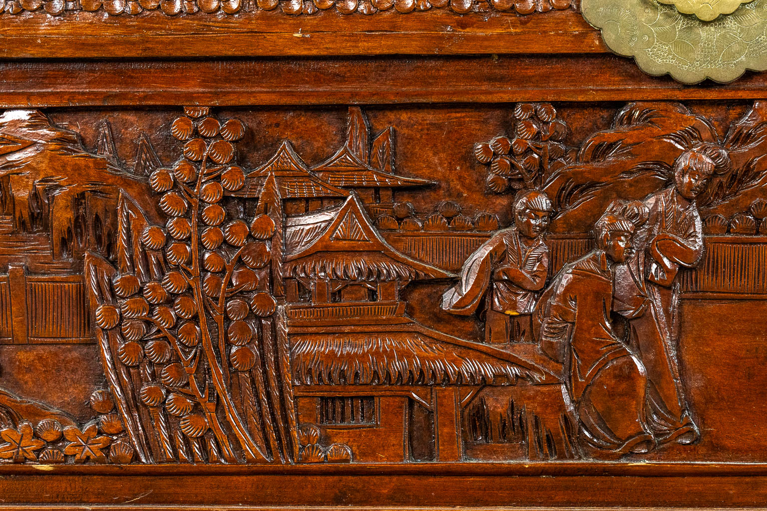 An Oriental sculptured chest, Camphor wood. (L:44 x W:89 x H:48 cm)