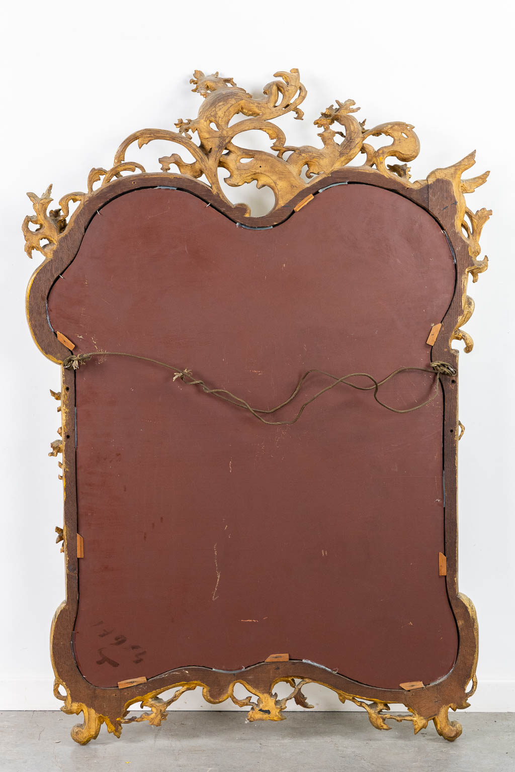 An antique wood-sculptured mirror, Louis XV style. Circa 1900. (W:93 x H:135 cm)