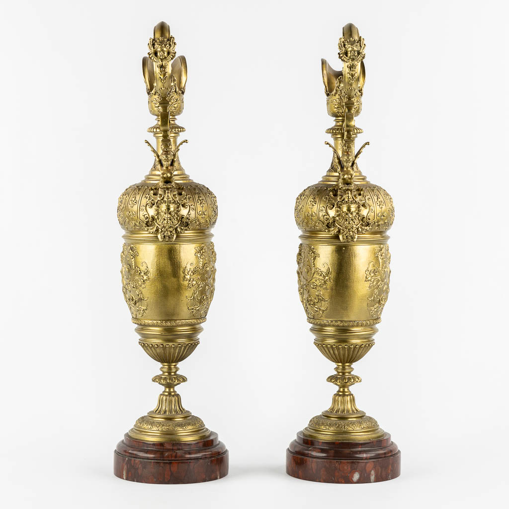 A large pair of pitchers, in the style of Ferdinand Barbedienne. 19th C. (L:15 x W:21 x H:59 cm)