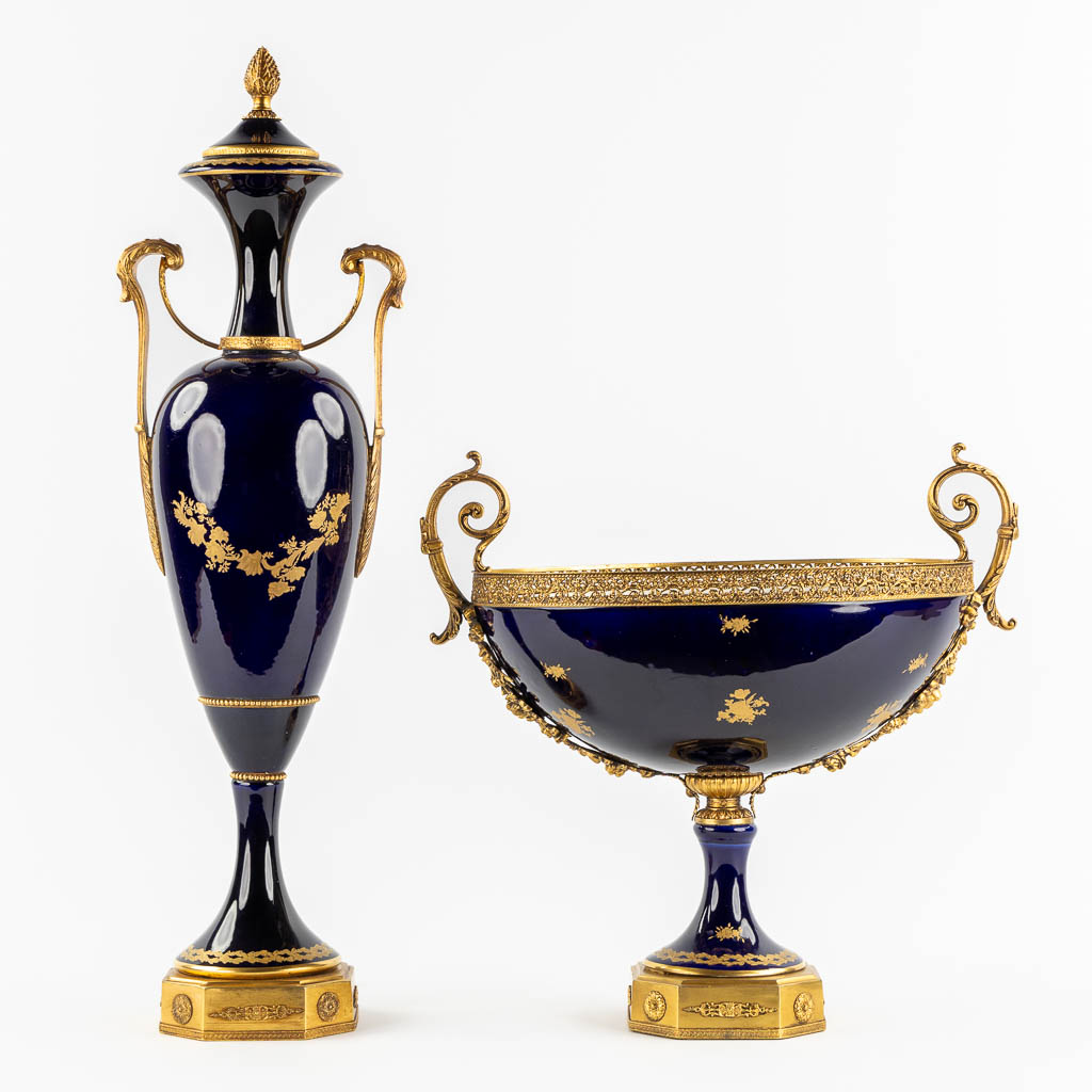 Sèvres, a bowl and a vase. Cobalt blue porcelain mounted with bronze. 20th C. (H:69 cm)