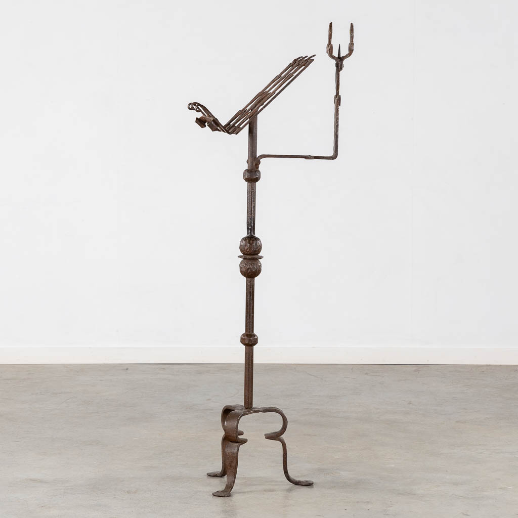 A wrought-iron lectern. 19th C. (W:40 x H:136 cm)