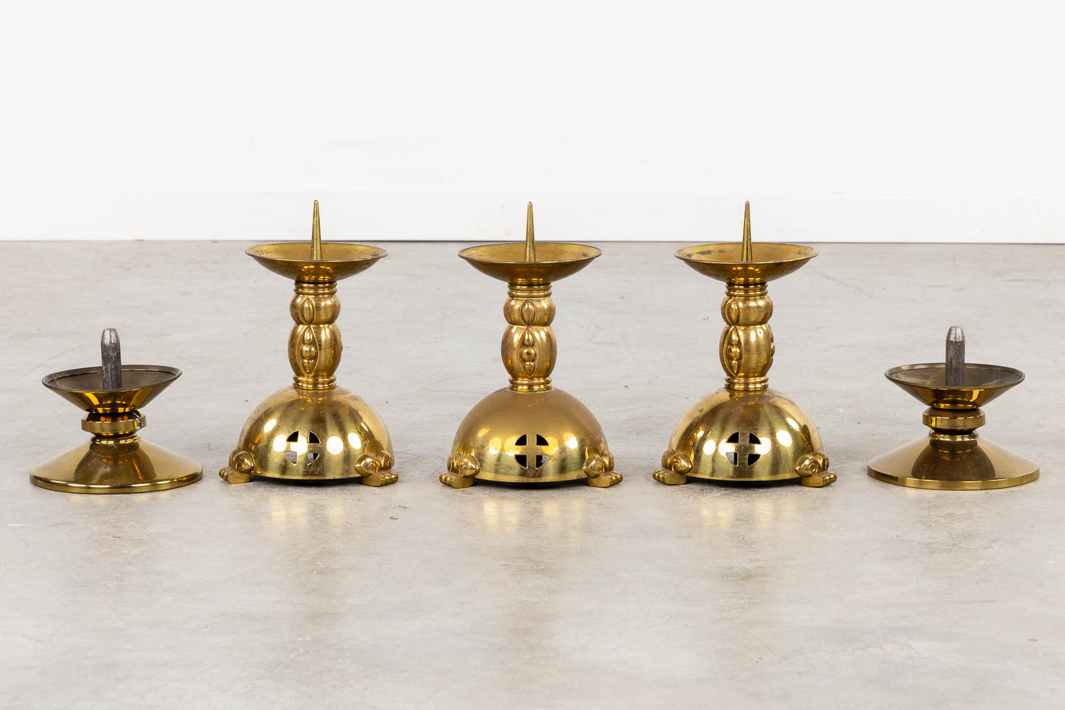 Thirteen Chruch candlesticks, brass and bronze. (H:40 cm)