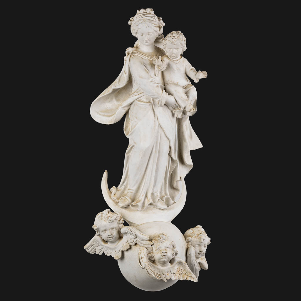 Madonna with a child, standing on a crescent moon, Baroque style. Circa 1900. (L:30 x W:42 x H:91 cm)