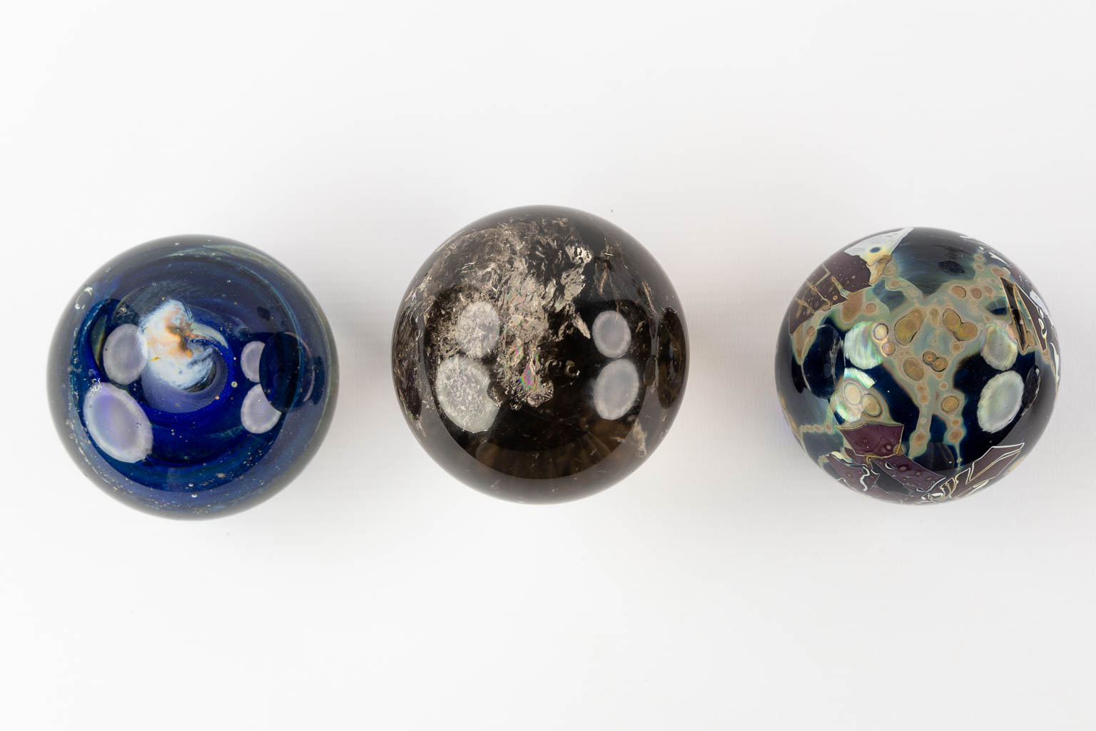 Louis Leloup, John Derian, Rock Crystal, a collection of 13 paperweights. (H:15 cm)