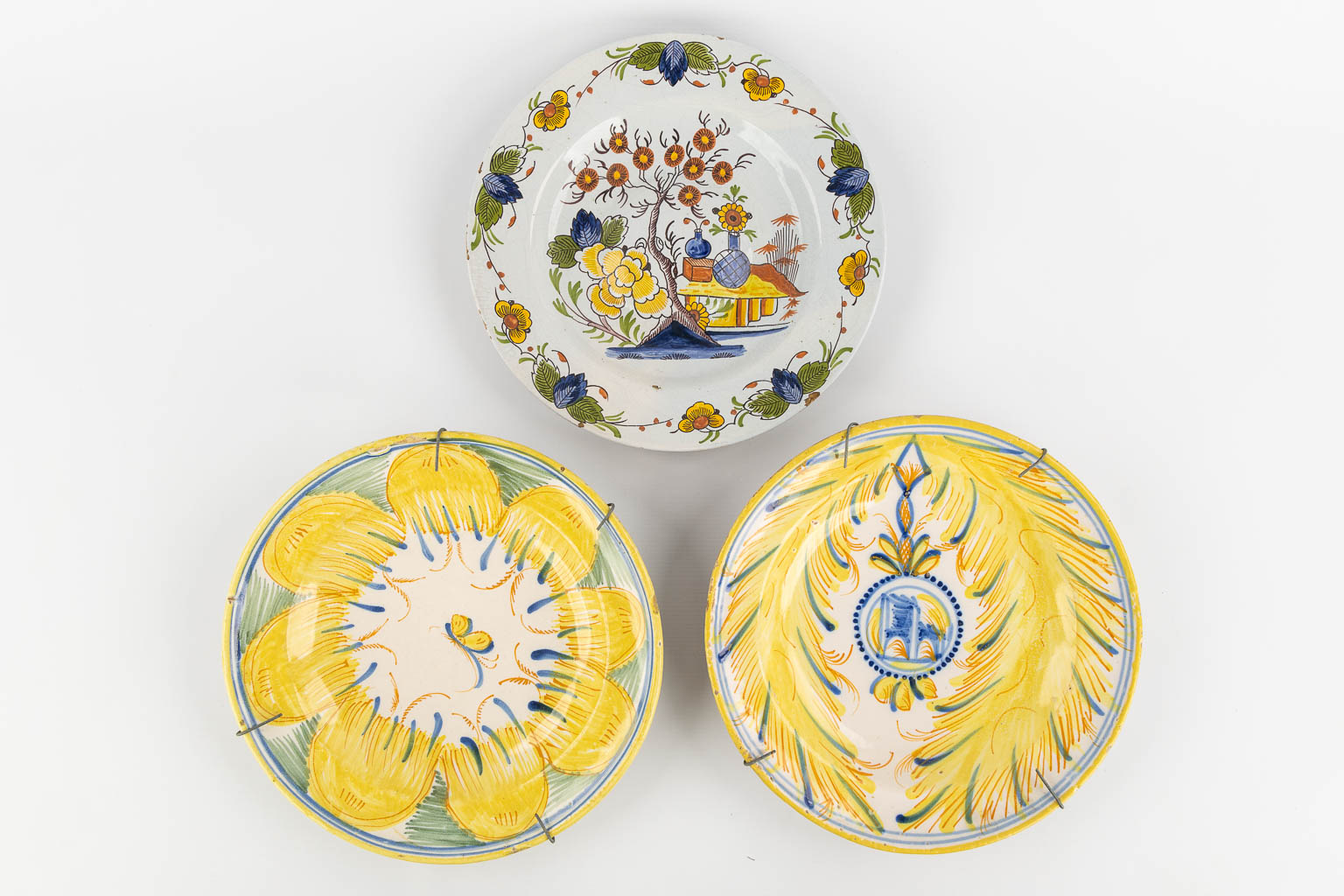 Seven Faience plates, France, 18th and 19th C. (D:42 cm)