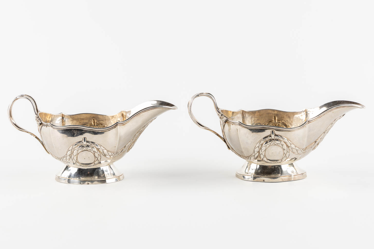 A pair of saucers, silver, Louis XVI. 