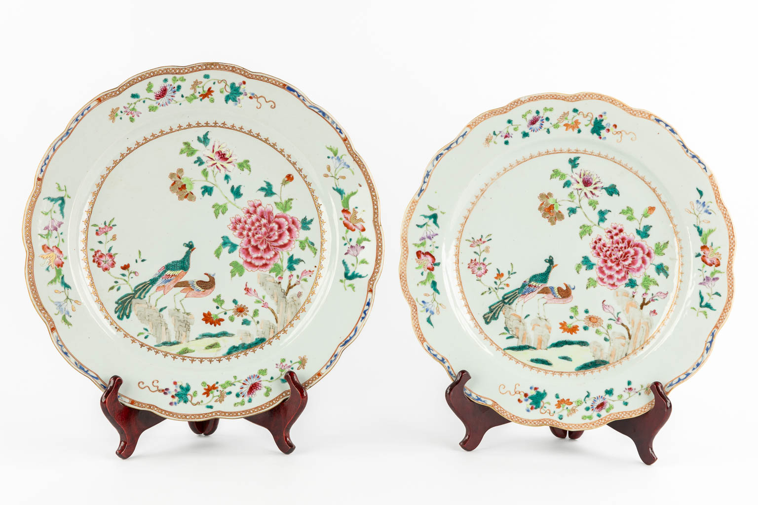 Two large Chinese Famille Rose plates, Double Peacock decor. 18th C. (D:41 cm)