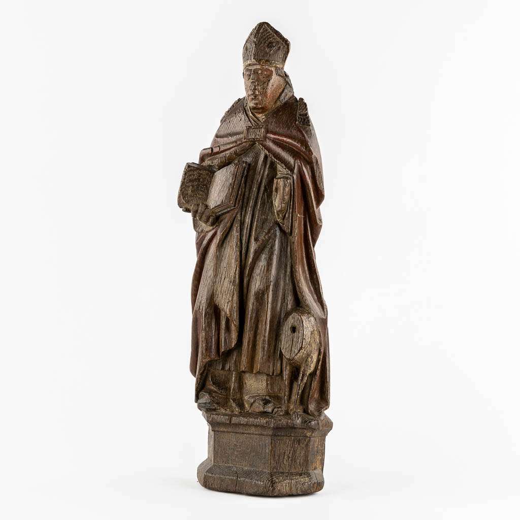 An antique wood-sculptured figurine of Saint Hubert of Liège, 17th/18th C.