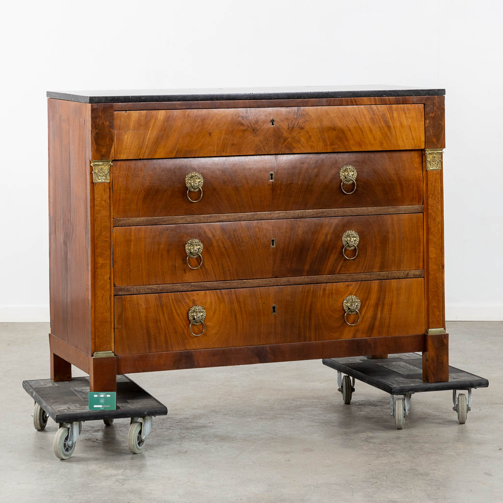 A four-drawer commode mounted with gilt bronze and a marble top, Empire. (L:53 x W:125 x H:98 cm)