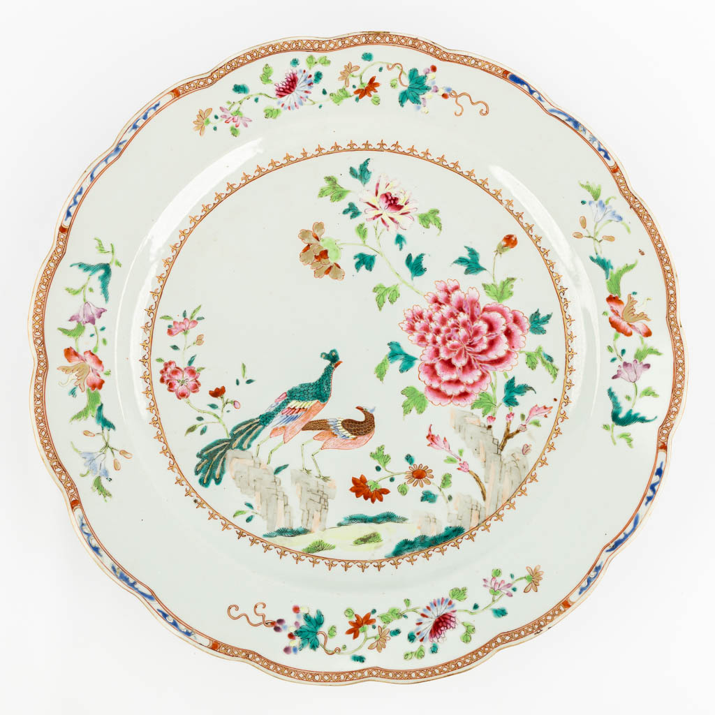 Two large Chinese Famille Rose plates, Double Peacock decor. 18th C. (D:41 cm)