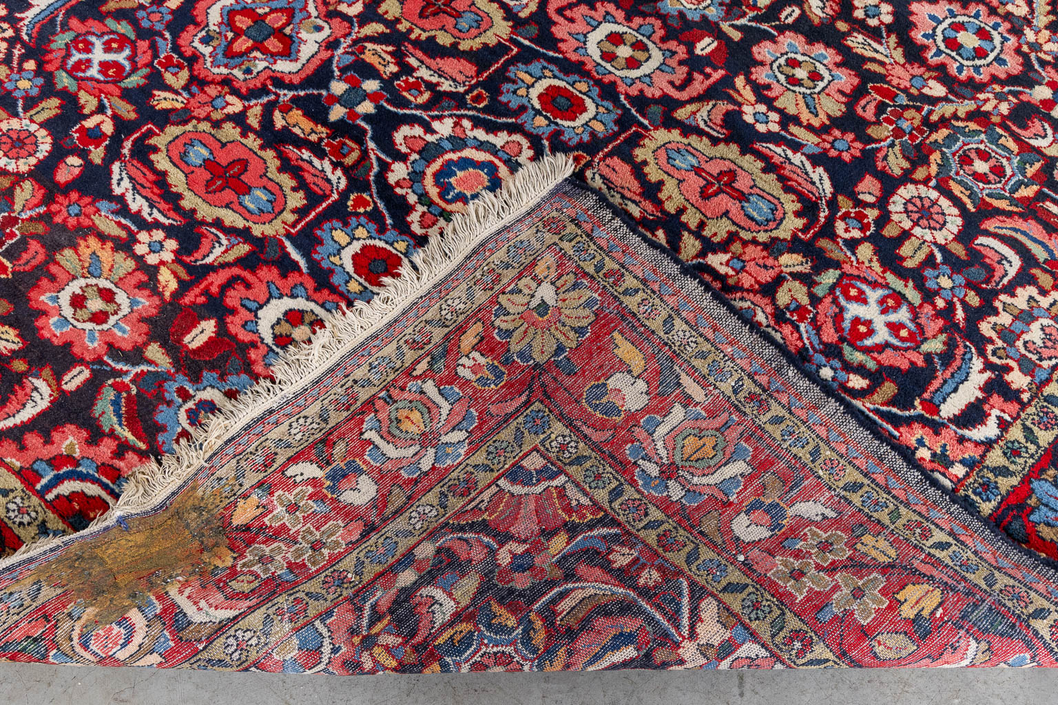 A hand-made carpet. (L:327 x W:222 cm)