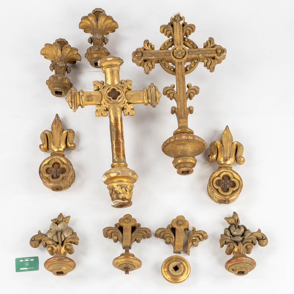 A set of antique wood-sculptured and patinated crucifixes and finials, thick silver-thread embroideries. 19th C. (W:37 x H:69 cm