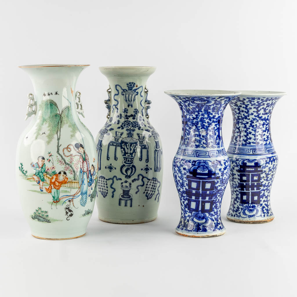 Four Chinese vases, blue white and polychrome. 