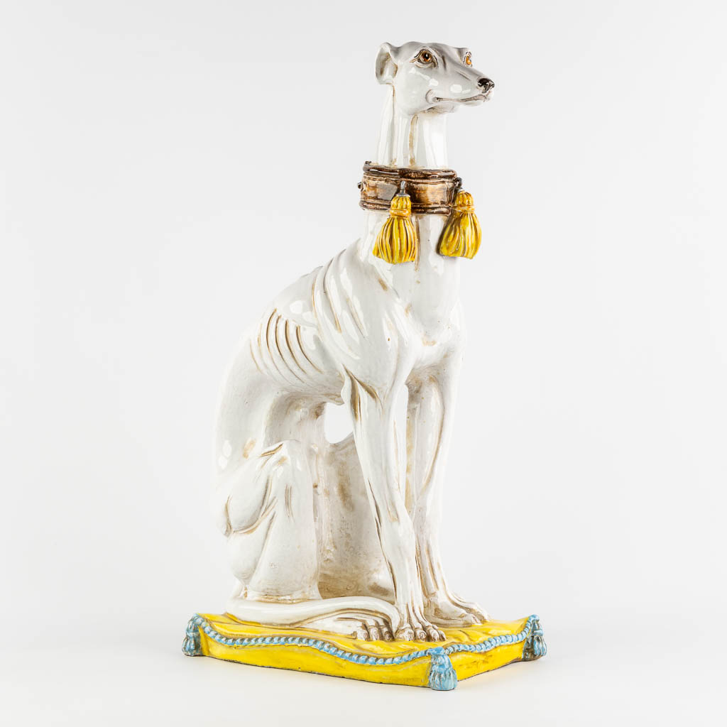 Figurine of a Greyhound, glazed terracotta. Italy, 20th C. (L:24 x W:42 x H:67 cm)