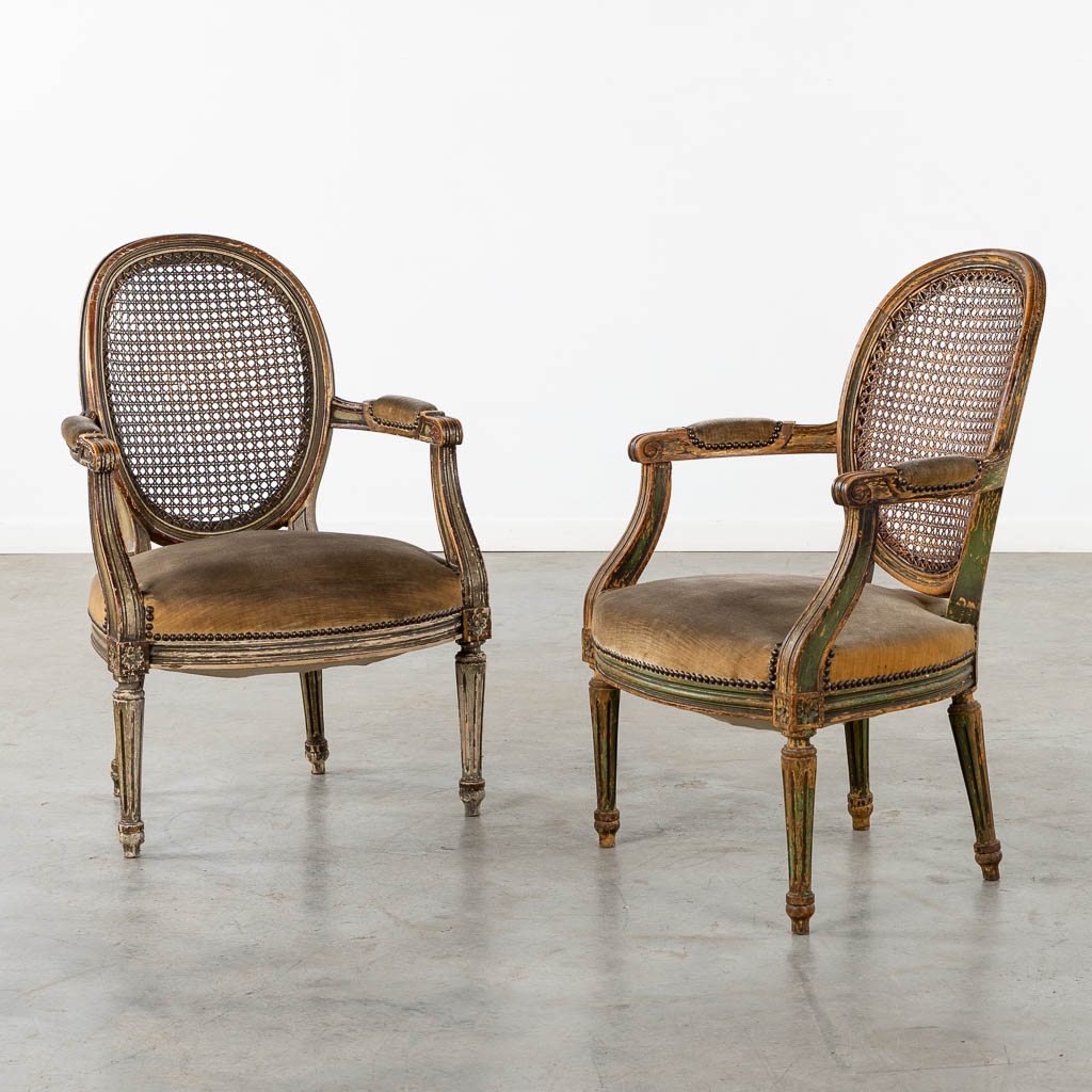 A pair of antique patinated chairs, Louis XVI style. (L:58 x W:57 x H:83 cm)