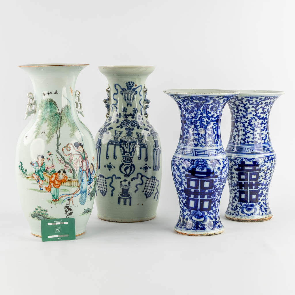 Four Chinese vases, blue white and polychrome. 