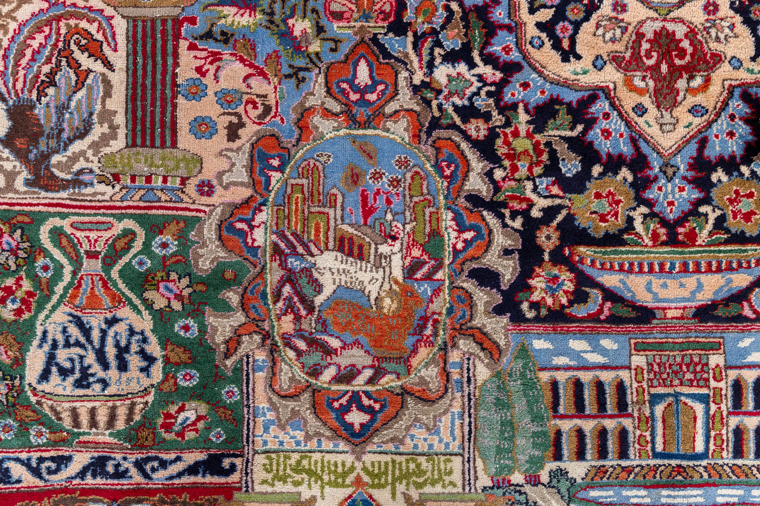 An Oriental hand-made carpet, Kashmar. (L:372 x W:305 cm)