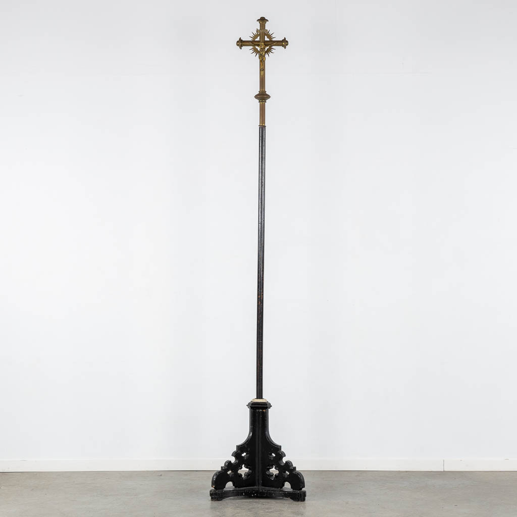 Four Processional crucifixes with their stands. Silver-plated metal and Brass. (H:265 cm)