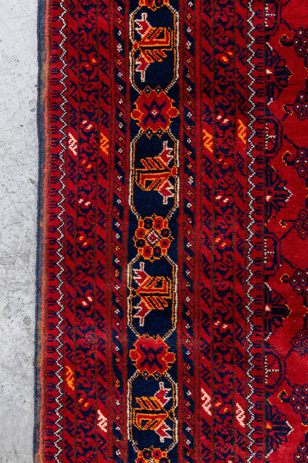 An Oriental hand-made carpet, Afghan. (L:290 x W:193 cm)