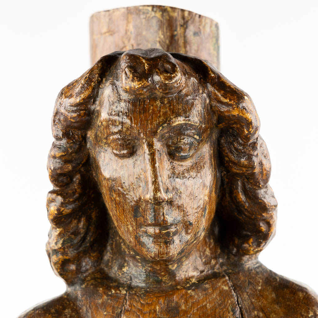 Heilige Sebastiaan, een antieke sculptuur, eik. 16de/17de eeuw.