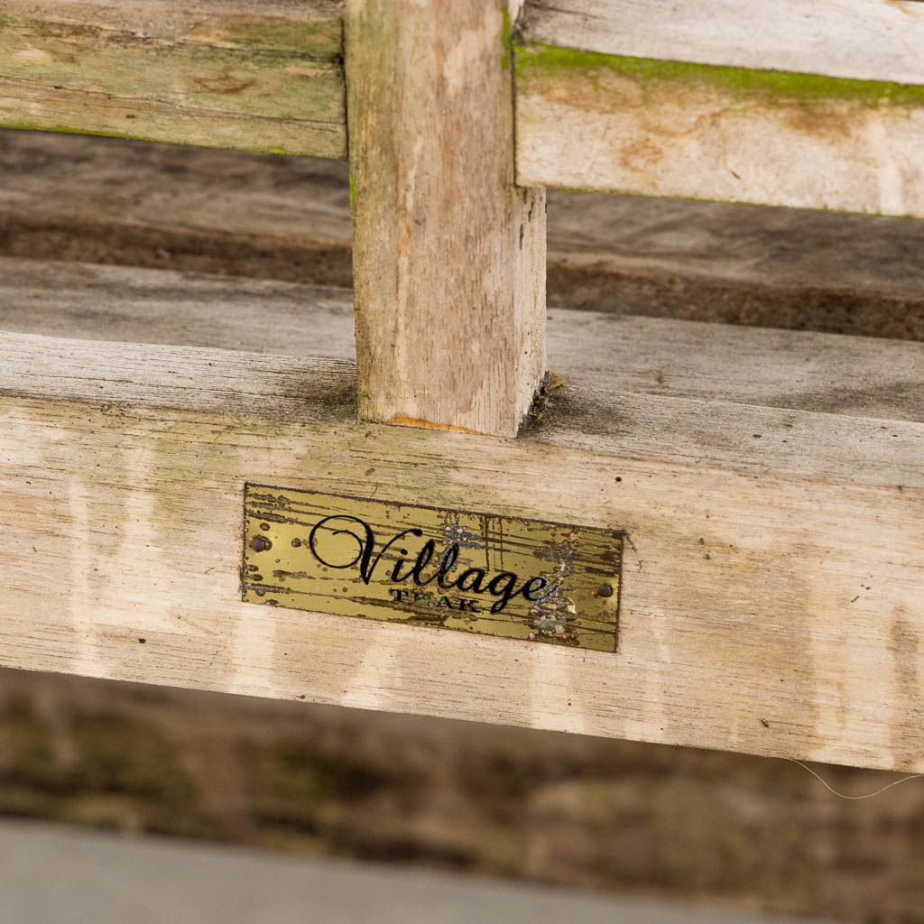 A teak garden bench. (L:60 x W:168 x H:104 cm)