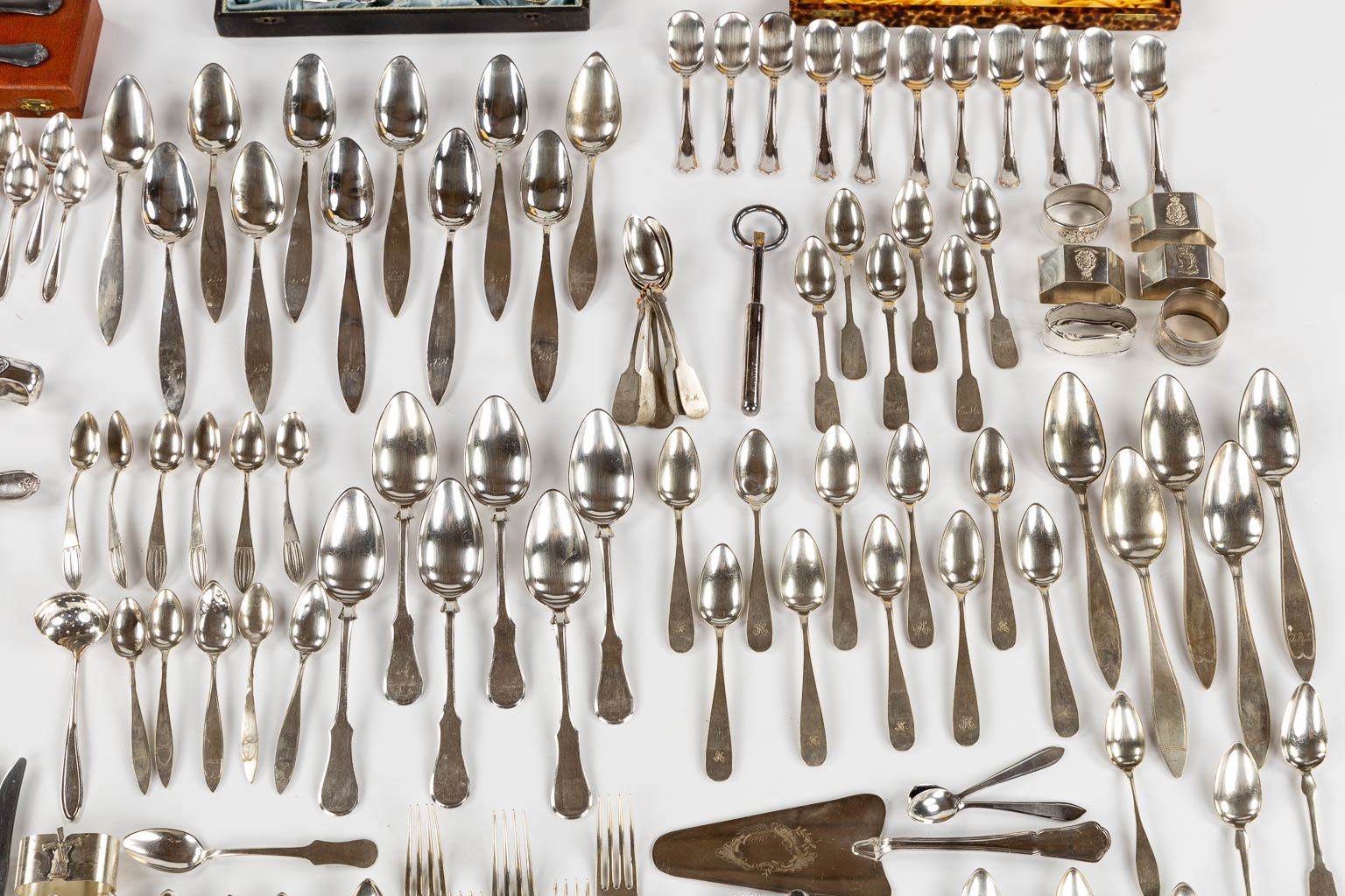 A large collection of silver and silver-plated cutlery. 