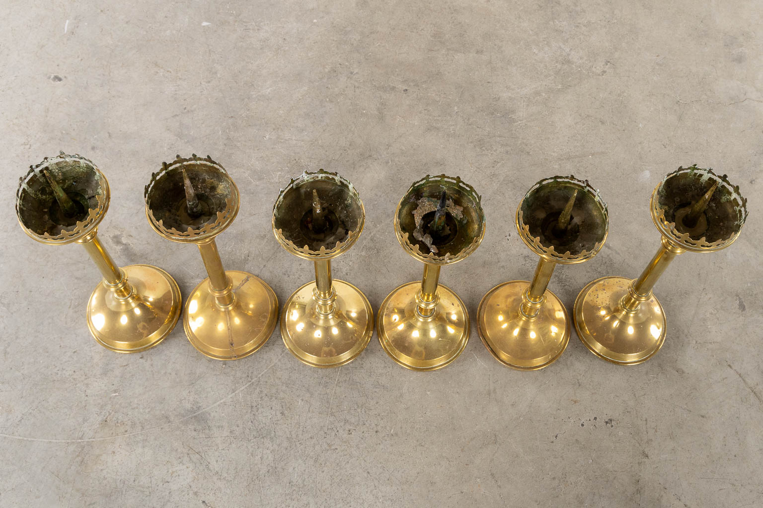 A set of 6 brass church candelsticks, Gothic Revival. (H:55 cm)