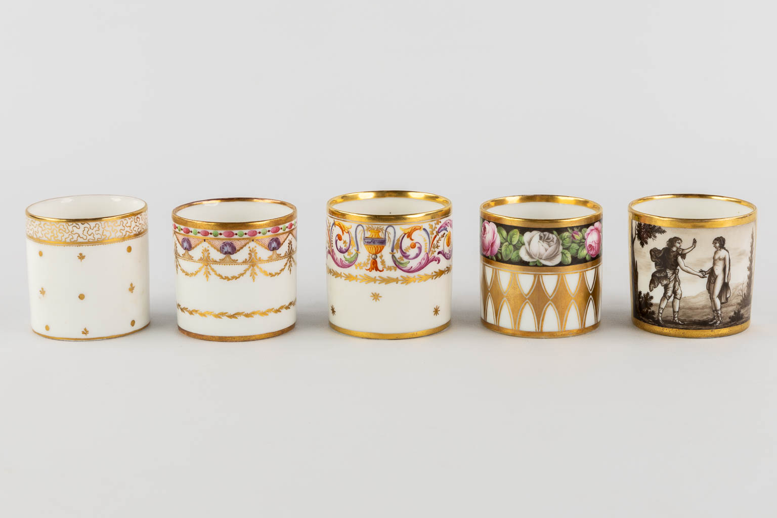 Various pieces of Vieux Bruxelles and Vieux Paris porcelain, mostly with gilt. 18th and 19th C. (H:18,5 cm)