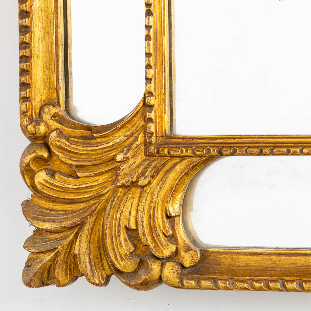 Deknudt, a decorative mirror in a Louis XV style. (W:65 x H:110 cm)