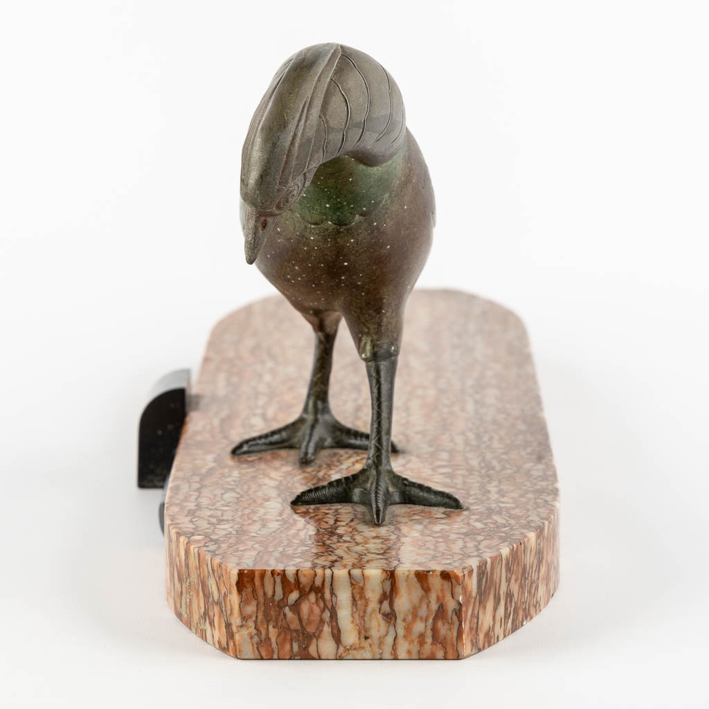 A figurine of a Pheasant, in the style of Rochard. Spelter. Art Deco. (L:16 x W:56 x H:20,5 cm)